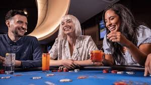 Live dealer spinning the American Roulette wheel